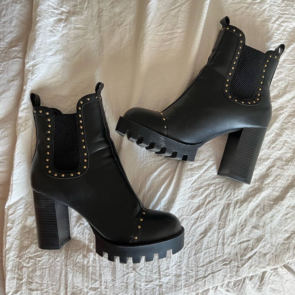 Black heeled studded boots